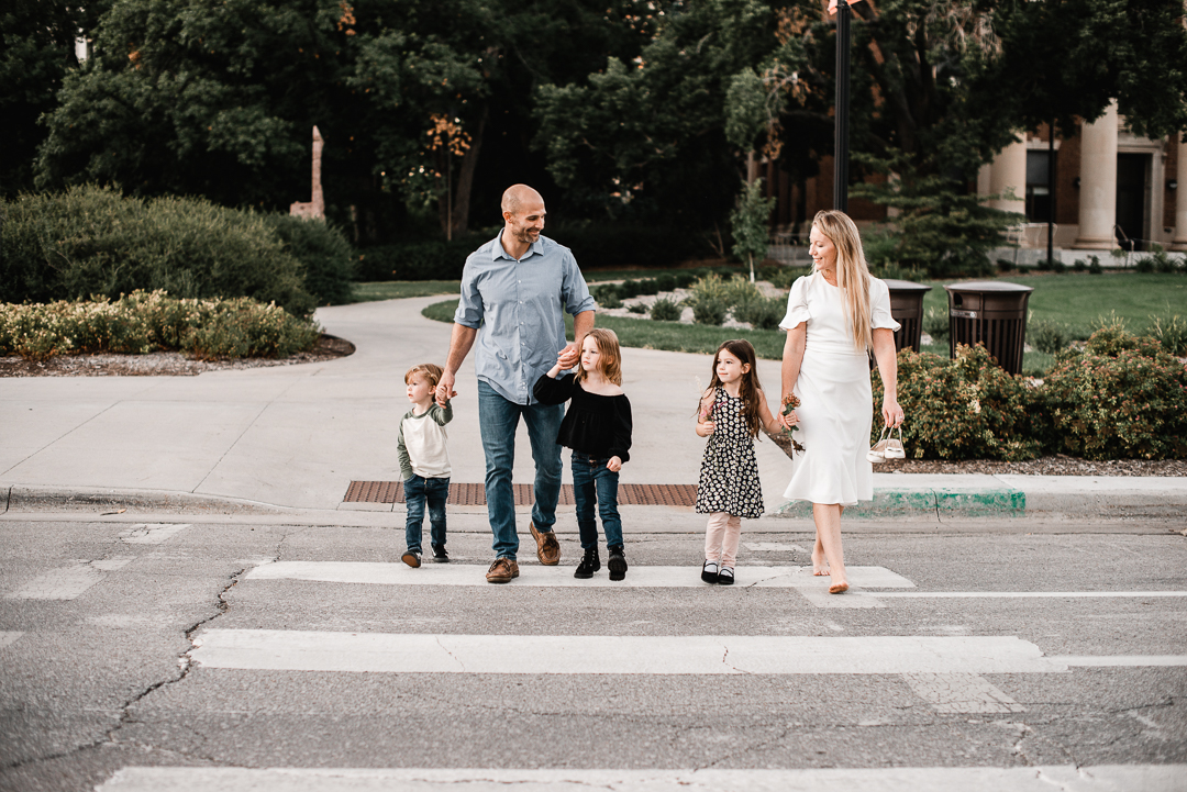 Omaha family enjoying a stroll during a family photography session with Melissa Lindquist photography at University of Nebraska at Lincoln.