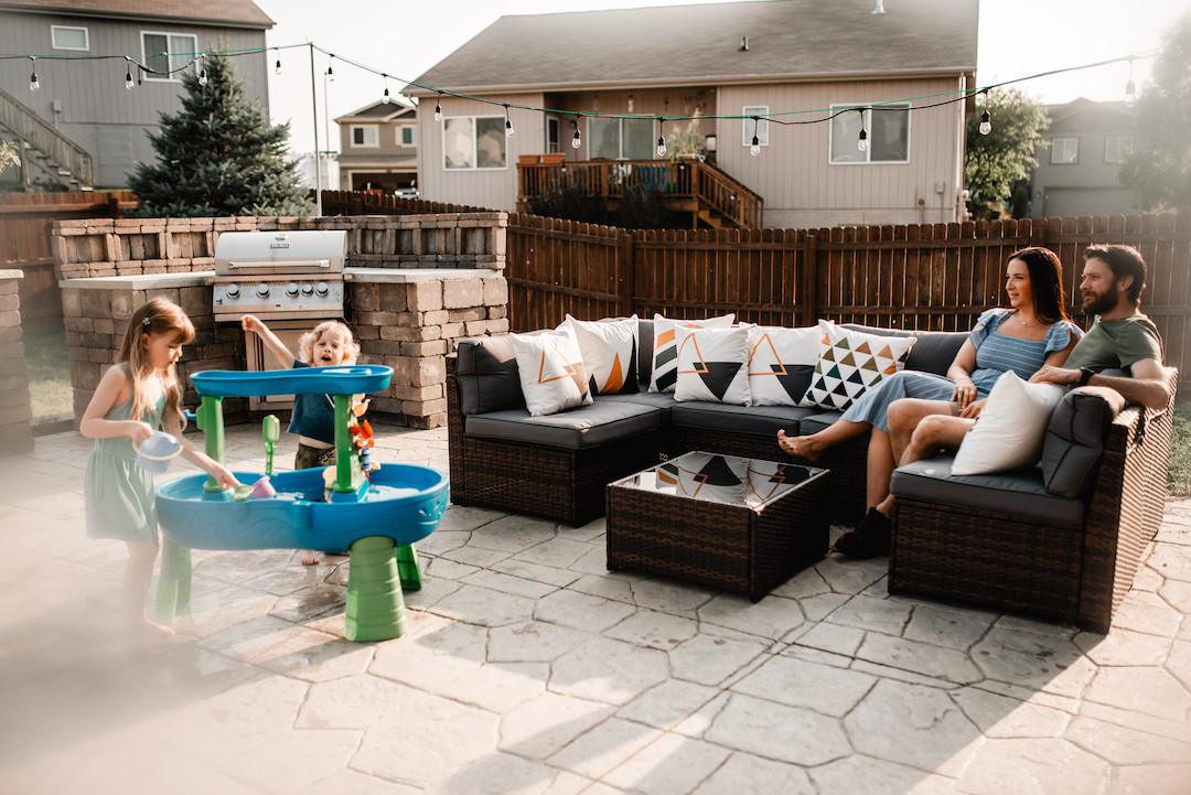 Family connecting at home during a cozy in-home photography session in Omaha, Nebraska
