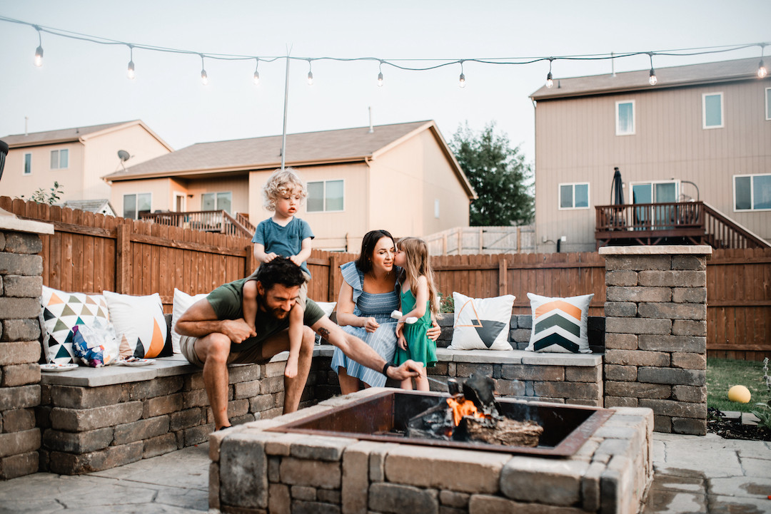 Candid family moments during an in-home family photography session in Omaha