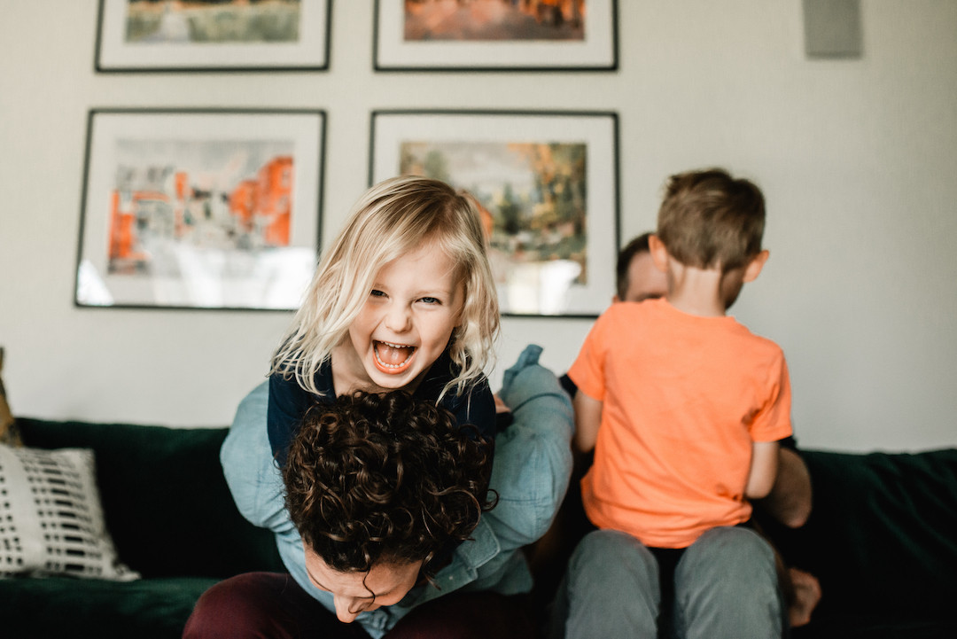 Warm and candid in-home family photography capturing everyday life in Omaha