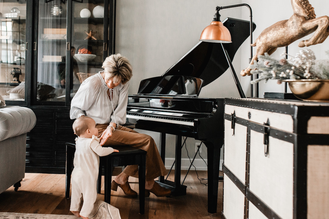 Family connecting at home during a cozy in-home photography session in Omaha, Nebraska