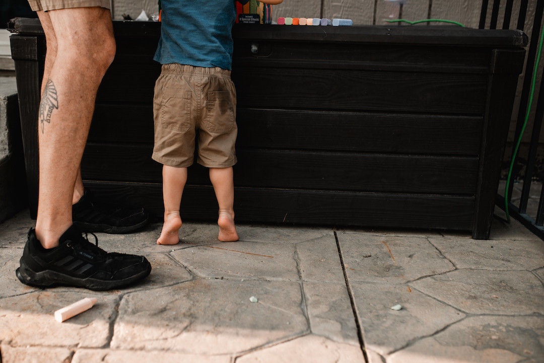 Joyful family moments captured during an in-home family session in Omaha