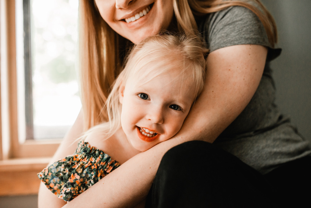 Warm and candid in-home family photography capturing everyday life in Omaha