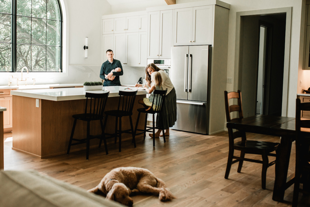 Authentic lifestyle newborn photography session inside an Omaha home