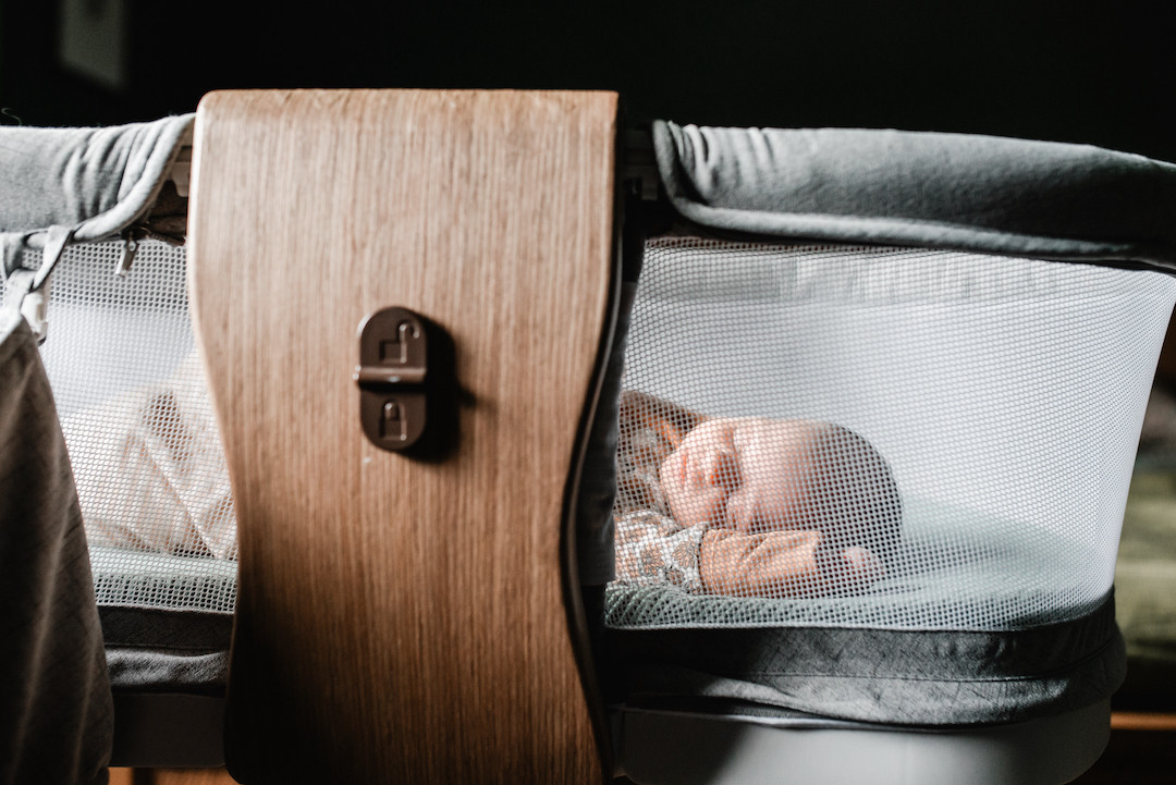 Authentic lifestyle newborn photography session inside an Omaha home