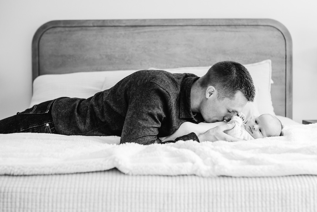 Relaxed lifestyle newborn photography session at home in Omaha, Nebraska
