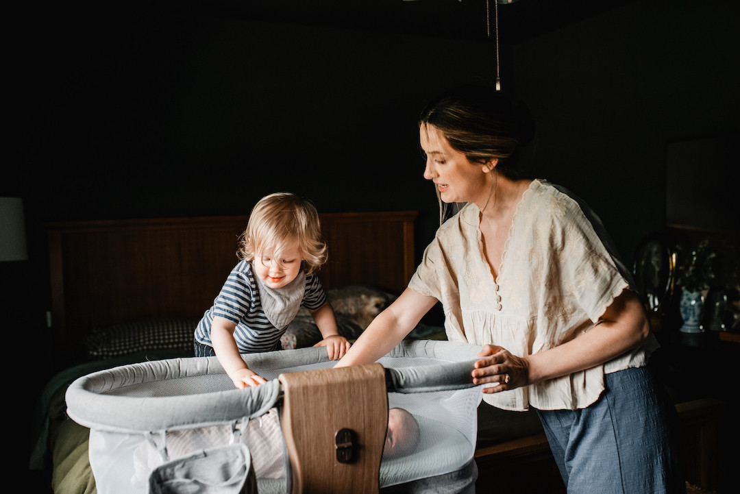 Candid in-home newborn photography documenting early days with a baby in Omaha